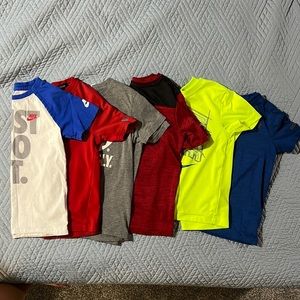Bundle of size 6 boy shirts—2 Russell brand, 2 Nike brand and 2 extra brand